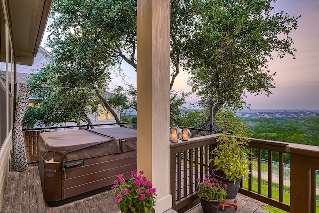 240 Townes Ct, Dripping Springs, TX 78620 - deck at dusk with a hot tub