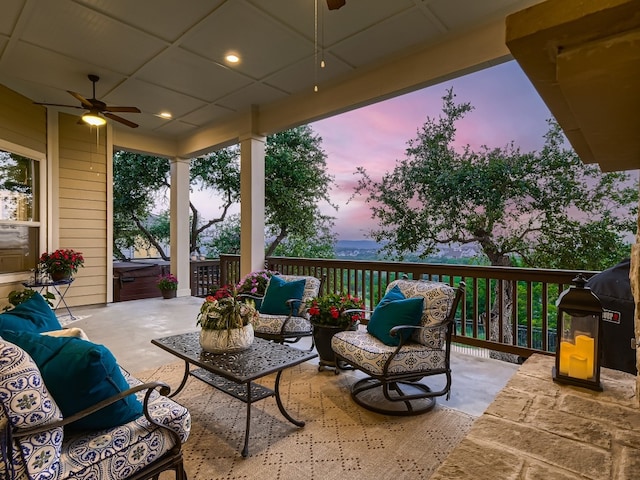 240 Townes Ct, Dripping Springs, TX 78620 - view of patio featuring ceiling fan, an outdoor hangout area, a hot tub, and a grill