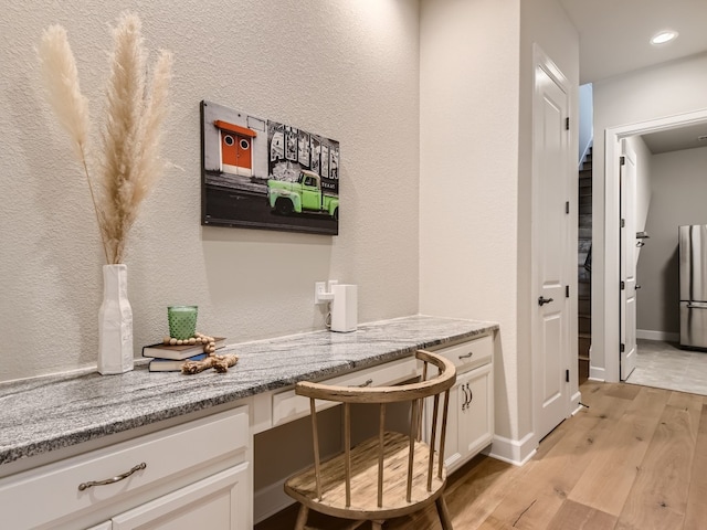 240 Townes Ct, Dripping Springs, TX 78620 - hall featuring light wood finished floors, recessed lighting, and baseboards