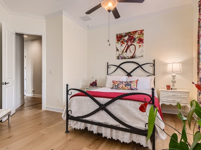 240 Townes Ct, Dripping Springs, TX 78620 - bedroom featuring light wood-style flooring, ornamental molding, baseboards, and ceiling fan