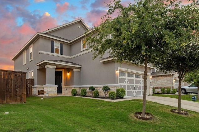 209 Sage Derby Dr, Hutto, TX 78634 - view of front of property featuring stone siding, stucco siding, and driveway