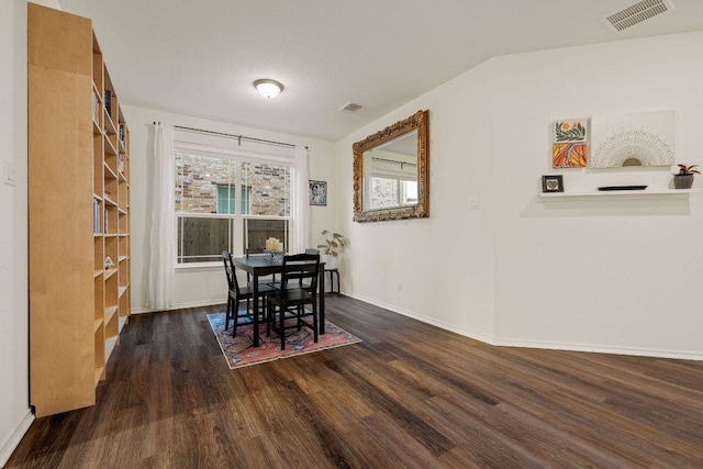 209 Sage Derby Dr, Hutto, TX 78634 - dining room with dark wood-style floors and baseboards