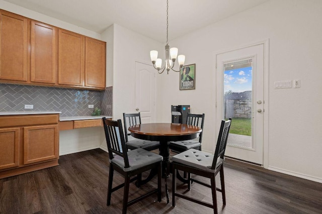 209 Sage Derby Dr, Hutto, TX 78634 - dining space with dark wood-type flooring, a chandelier, and baseboards