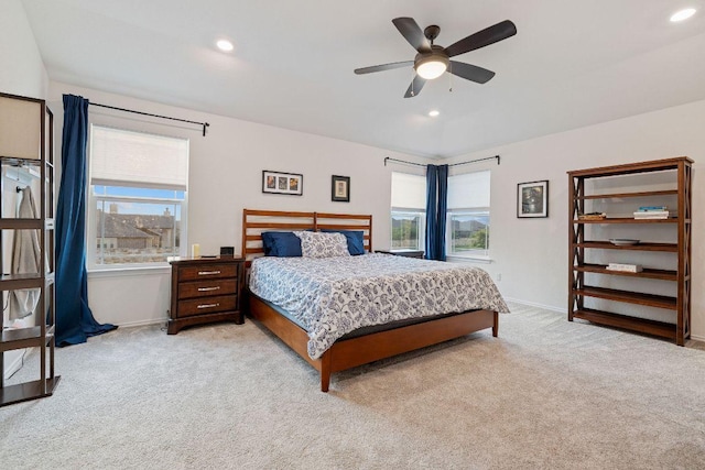 209 Sage Derby Dr, Hutto, TX 78634 - bedroom with light carpet, baseboards, recessed lighting, and a ceiling fan
