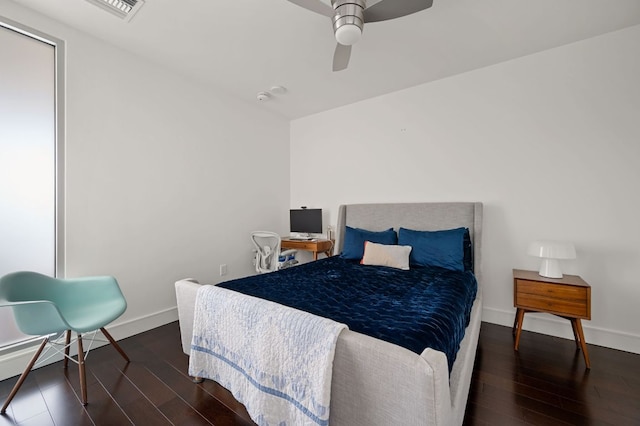 222 W Ave Unit 1908, Austin, TX 78701 - bedroom featuring wood finished floors, baseboards, and ceiling fan