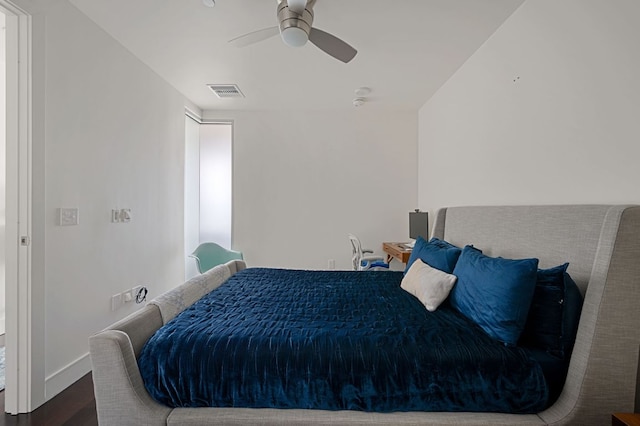 222 W Ave Unit 1908, Austin, TX 78701 - bedroom featuring wood finished floors, baseboards, and ceiling fan
