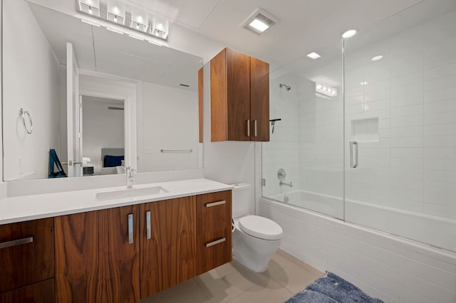 222 W Ave Unit 1908, Austin, TX 78701 - bathroom with enclosed tub / shower combo, vanity, toilet, and tile patterned floors