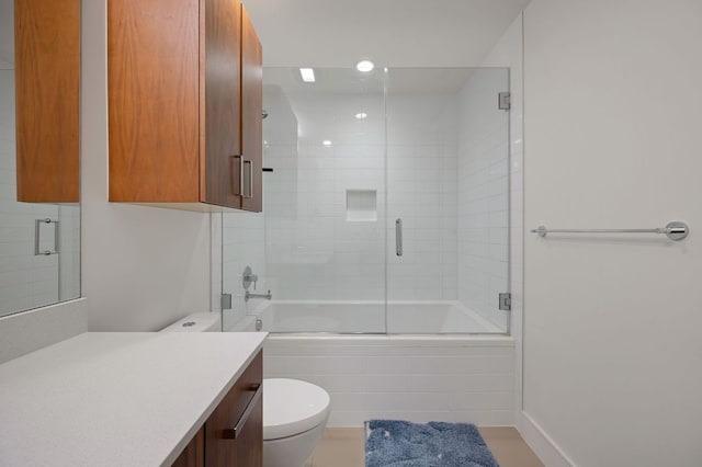 222 W Ave Unit 1908, Austin, TX 78701 - bathroom featuring vanity, toilet, tiled shower / bath, and recessed lighting