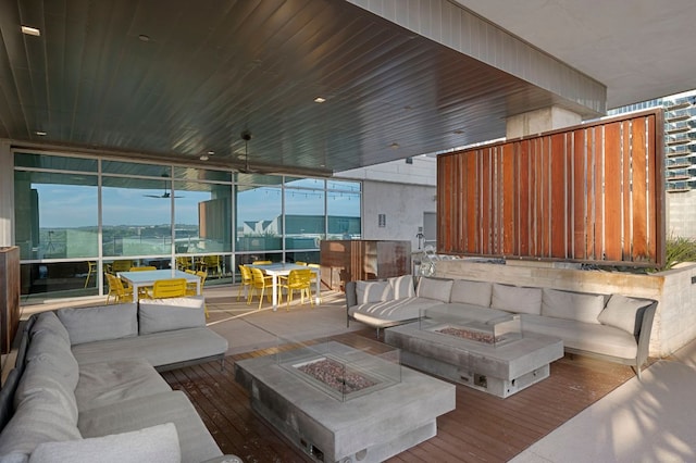222 W Ave Unit 1908, Austin, TX 78701 - living room featuring a wall of windows and hardwood / wood-style floors