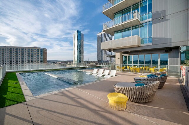222 W Ave Unit 1908, Austin, TX 78701 - community pool with a patio