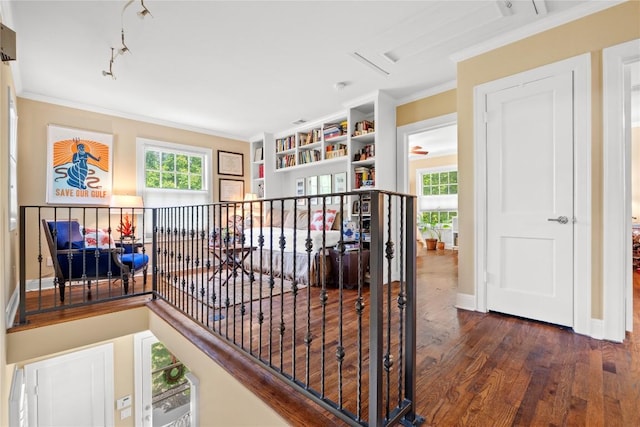 1704 W 34th St, Austin, TX 78703 - hallway featuring crown molding and wood finished floors
