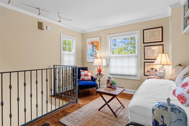 1704 W 34th St, Austin, TX 78703 - bedroom with ornamental molding, wood finished floors, baseboards, and track lighting