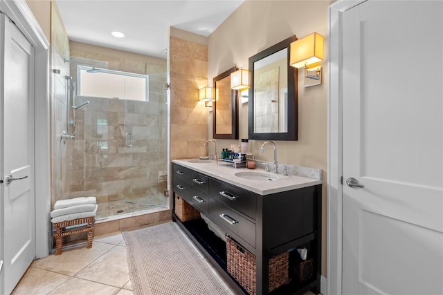 1704 W 34th St, Austin, TX 78703 - bathroom with a shower stall, double vanity, and tile patterned floors