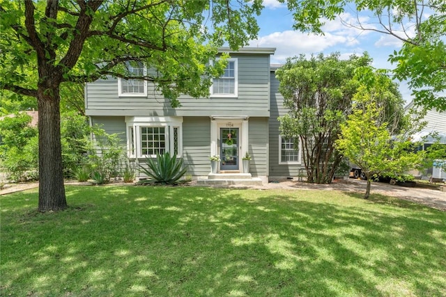 1704 W 34th St, Austin, TX 78703 - colonial home featuring a front yard
