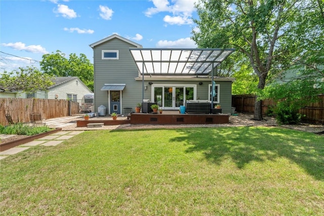 1704 W 34th St, Austin, TX 78703 - back of house featuring an outdoor living space and a patio area