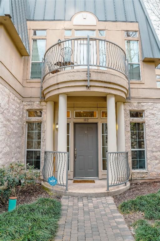 2918 Ranch Road 620th Rd N Unit J162, Austin, TX 78734 - entrance to property with a balcony and covered porch