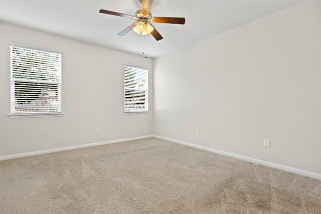 711 Rolling Oak Dr Unit 106, Round Rock, TX 78664 - carpeted spare room with baseboards and a ceiling fan