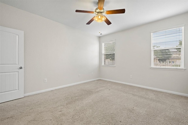 711 Rolling Oak Dr Unit 106, Round Rock, TX 78664 - carpeted spare room featuring baseboards and ceiling fan
