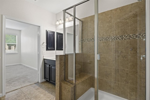 711 Rolling Oak Dr Unit 106, Round Rock, TX 78664 - full bath with a stall shower, vanity, and tile patterned floors