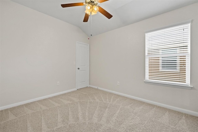711 Rolling Oak Dr Unit 106, Round Rock, TX 78664 - spare room with light colored carpet, baseboards, a ceiling fan, and lofted ceiling