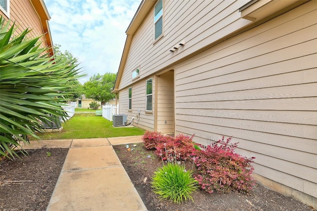 711 Rolling Oak Dr Unit 106, Round Rock, TX 78664 - view of green lawn featuring cooling unit
