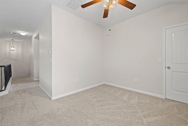 711 Rolling Oak Dr Unit 106, Round Rock, TX 78664 - empty room featuring carpet floors, a ceiling fan, lofted ceiling, and baseboards