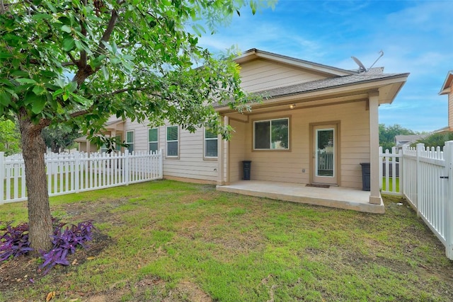 711 Rolling Oak Dr Unit 106, Round Rock, TX 78664 - back of house featuring a patio area