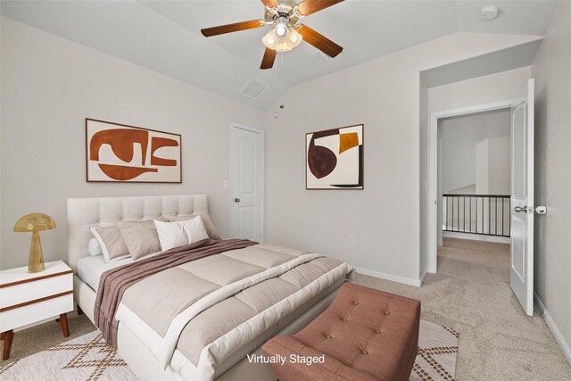 711 Rolling Oak Dr Unit 106, Round Rock, TX 78664 - bedroom with light colored carpet, lofted ceiling, baseboards, and ceiling fan