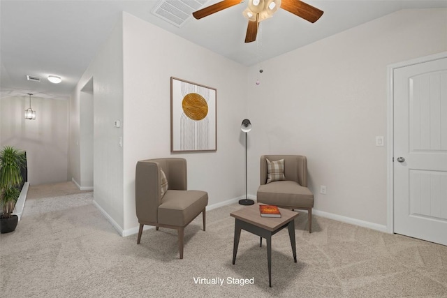 711 Rolling Oak Dr Unit 106, Round Rock, TX 78664 - living area featuring carpet floors, ceiling fan, and baseboards