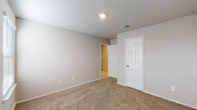 616 Stone Valley Rd, Temple, TX 76502 - unfurnished bedroom featuring carpet floors, baseboards, and a closet