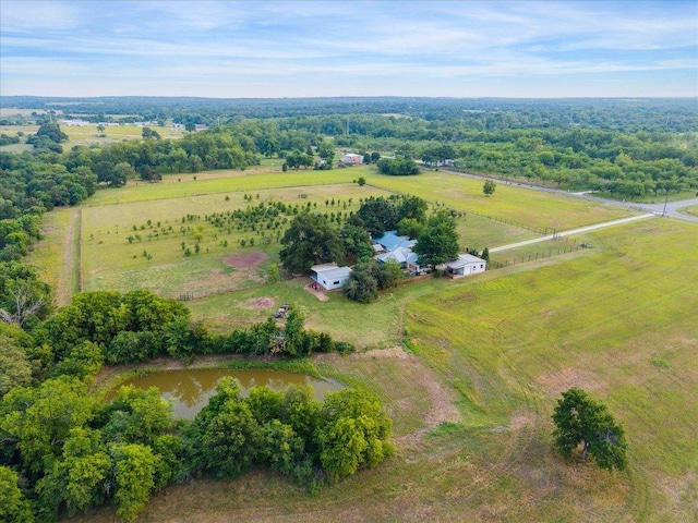4451 County Road 467, Elgin, TX 78621 - aerial view of property and surrounding area featuring rural landscape and a nearby body of water