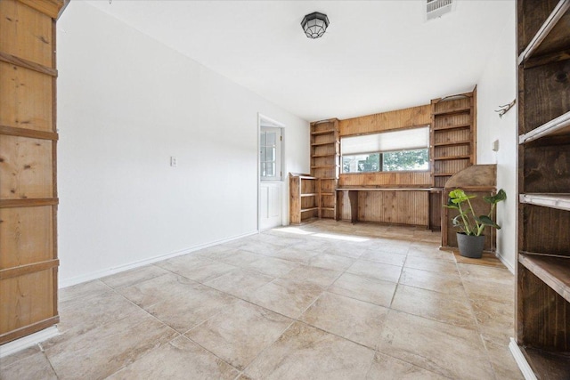 4451 County Road 467, Elgin, TX 78621 - unfurnished living room featuring built in features