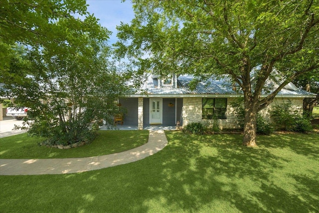 4451 County Road 467, Elgin, TX 78621 - view of front of property featuring stone siding and a front yard