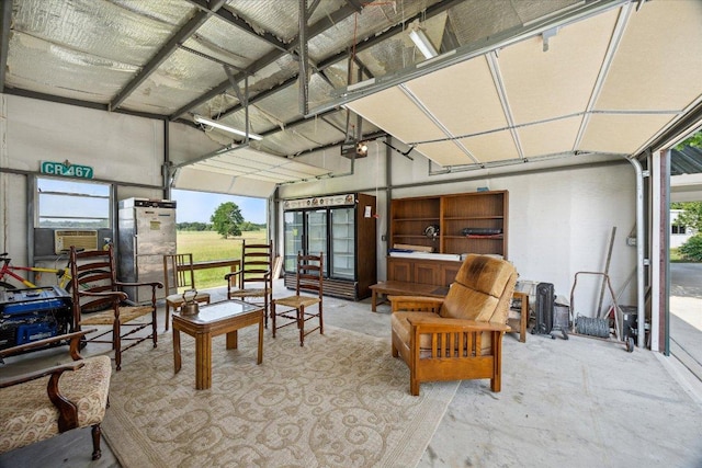 4451 County Road 467, Elgin, TX 78621 - garage with a garage door opener and cooling unit
