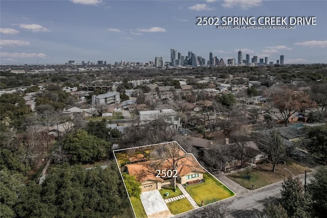 2502 Spring Creek Dr, Austin, TX 78704 - view of property location with property boundaries highlighted and city skyline