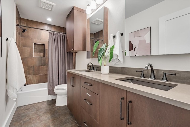 2502 Spring Creek Dr, Austin, TX 78704 - full bath with toilet, shower / bath combo with shower curtain, double vanity, and recessed lighting