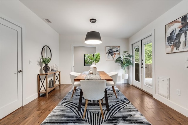 2502 Spring Creek Dr, Austin, TX 78704 - dining space with wood-type flooring, french doors, and baseboards