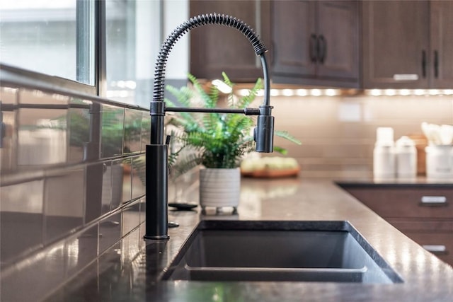 2502 Spring Creek Dr, Austin, TX 78704 - kitchen view of a sink and tasteful backsplash