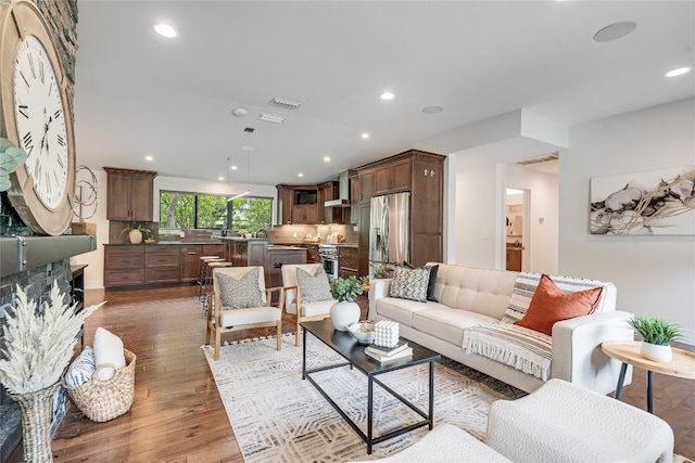 2502 Spring Creek Dr, Austin, TX 78704 - living room featuring wood finished floors and recessed lighting