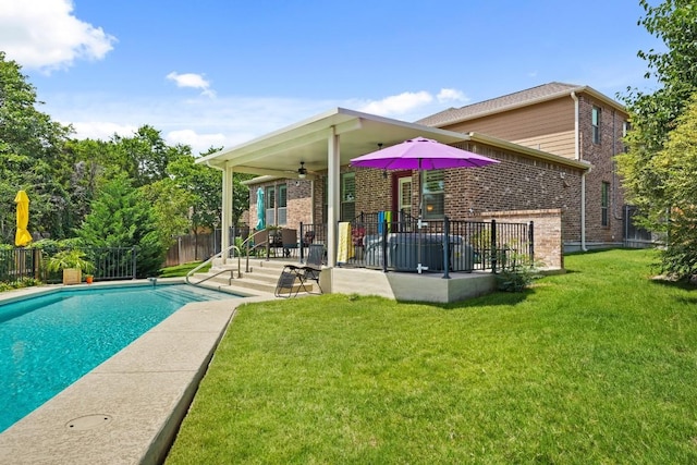 900 Lily Pad, Leander, TX 78641 - back of house with a ceiling fan, brick siding, and a patio area