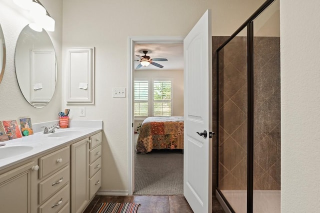 900 Lily Pad, Leander, TX 78641 - full bathroom with a stall shower, a ceiling fan, ensuite bathroom, and double vanity