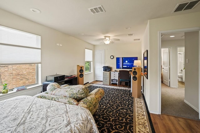 900 Lily Pad, Leander, TX 78641 - bedroom with wood finished floors, an office area, a ceiling fan, baseboards, and recessed lighting