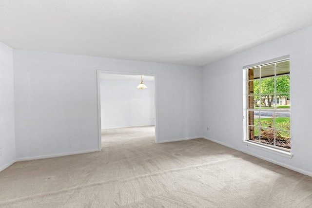 2305 Preston Trails Cv, Austin, TX 78747 - carpeted empty room featuring baseboards