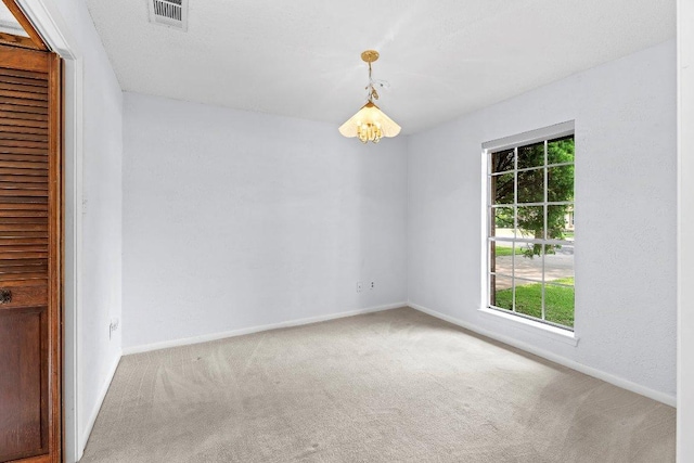 2305 Preston Trails Cv, Austin, TX 78747 - carpeted empty room with baseboards