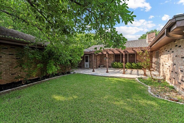 2305 Preston Trails Cv, Austin, TX 78747 - view of grassy yard featuring a pergola and a patio
