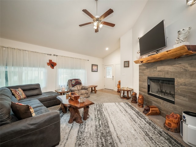 116 Naalehu Ct, Bastrop, TX 78602 - living area with ceiling fan, a tile fireplace, and high vaulted ceiling