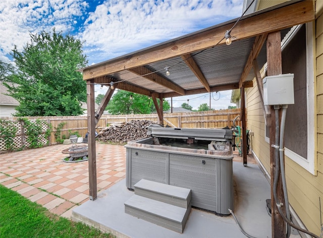 116 Naalehu Ct, Bastrop, TX 78602 - fenced backyard featuring a patio and an outdoor fire pit