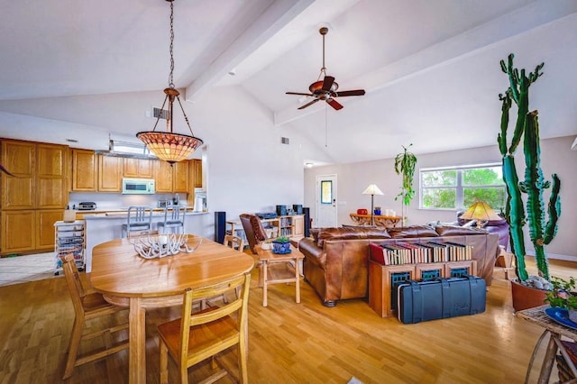 1231 Montell Rd, Wimberley, TX 78676 - dining area with light wood-style floors and a ceiling fan