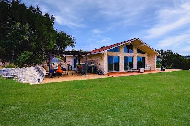 1231 Montell Rd, Wimberley, TX 78676 - rear view of house featuring stone siding, a lawn, a pergola, and a patio