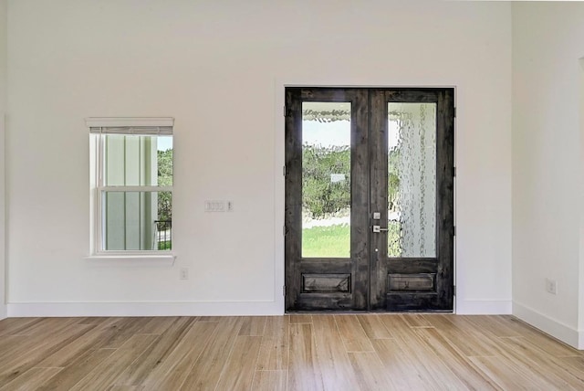 2803 Wilson Ave, Lago Vista, TX 78645 - entrance foyer featuring wood finished floors and french doors